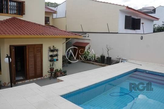 Casa à venda com 3 quartos, 287m², 1 suíte, 4 vagas, Rua Padre Todesco no bairro Partenon em Porto Alegre