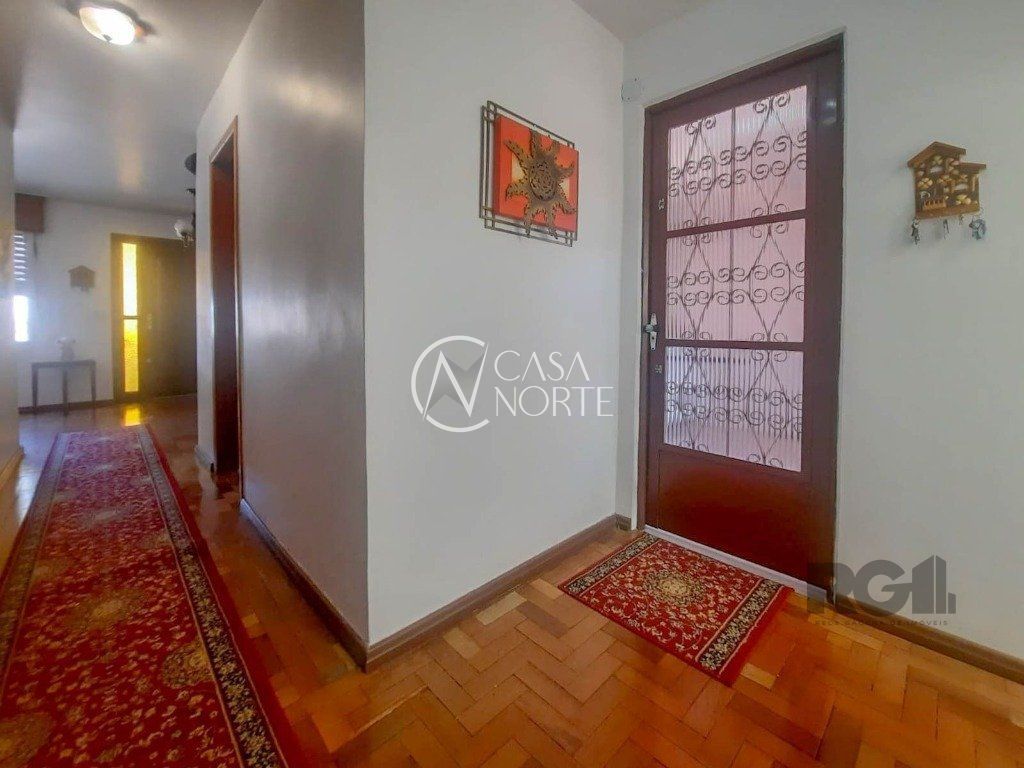 Casa à venda com 4 quartos, 240m², 2 vagas, Rua Engenheiro Oscar da Cunha Correa no bairro Jardim Carvalho em Porto Alegre