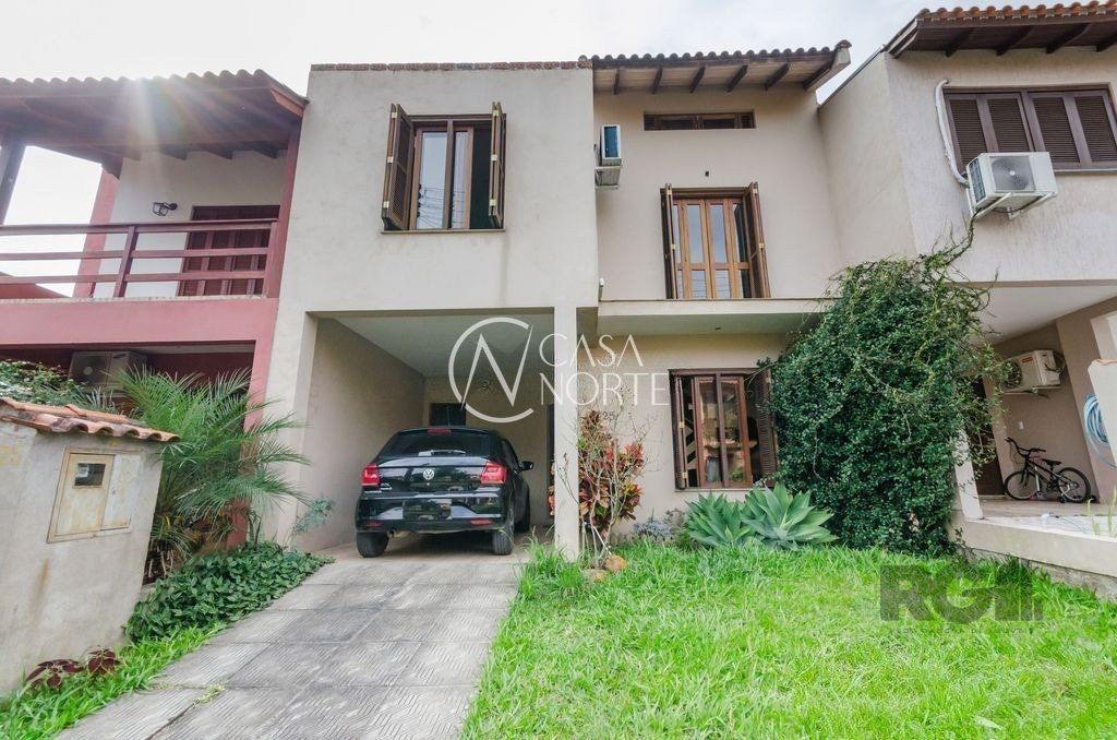 Casa de Condomínio à venda com 3 quartos, 166m², 1 suíte, 2 vagas, Rua Ponciano Pacheco da Silveira no bairro Guarujá em Porto Alegre