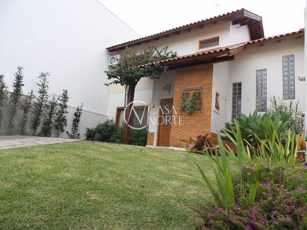 Casa de Condomínio à venda com 3 quartos, 198m², 1 suíte, 4 vagas, Rua Francisco Solano Borges no bairro Hípica em Porto Alegre