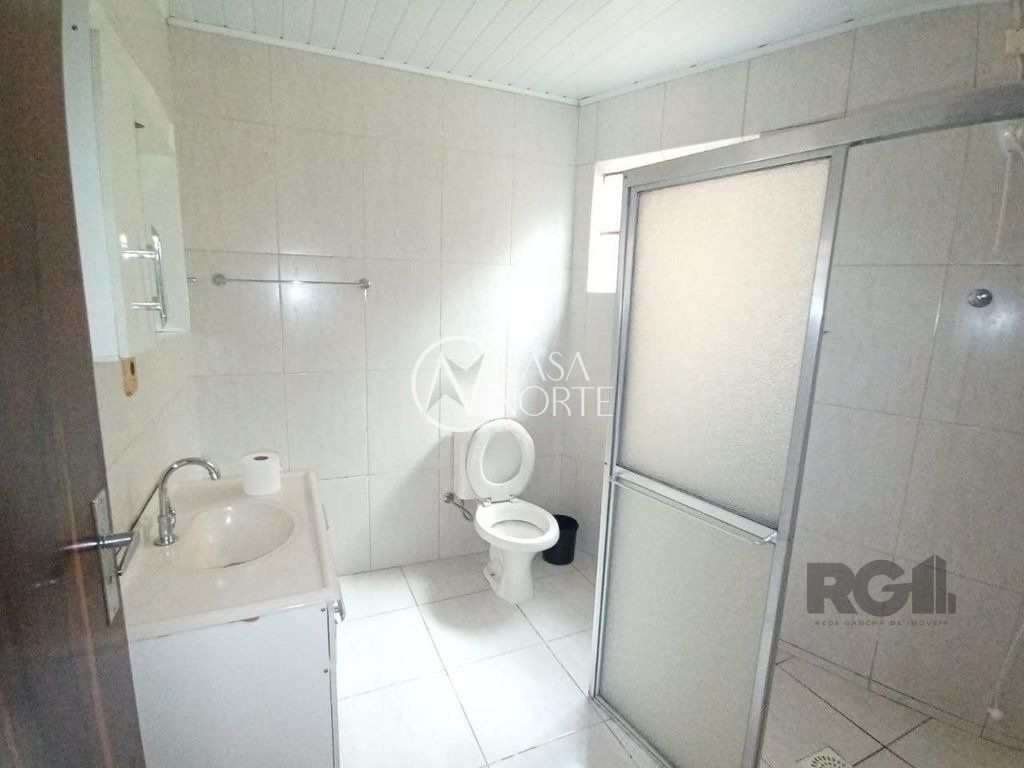 Casa à venda com 2 quartos, 121m², 3 vagas, Avenida Vereador Roberto Landell de Moura no bairro Campo Novo em Porto Alegre