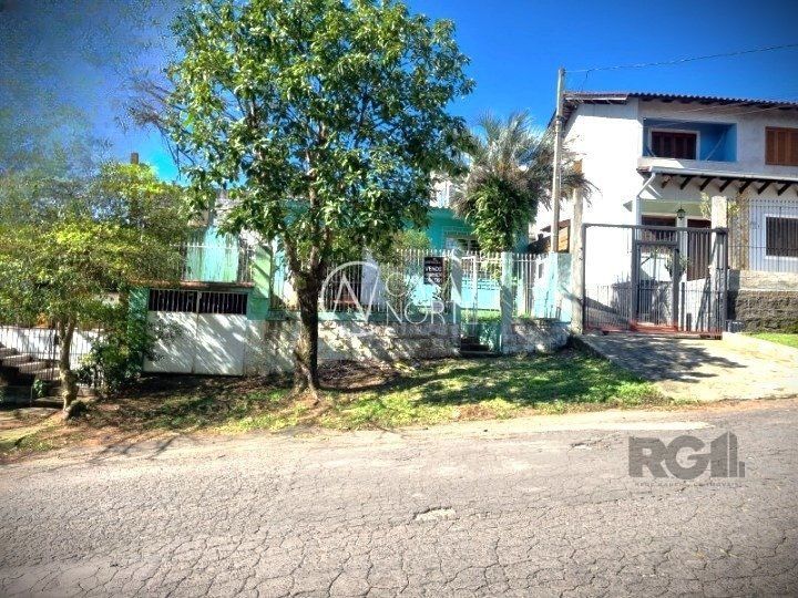 Casa à venda com 4 quartos, 95m², 1 vaga, Rua Sebastião Wolf no bairro Nonoai em Porto Alegre