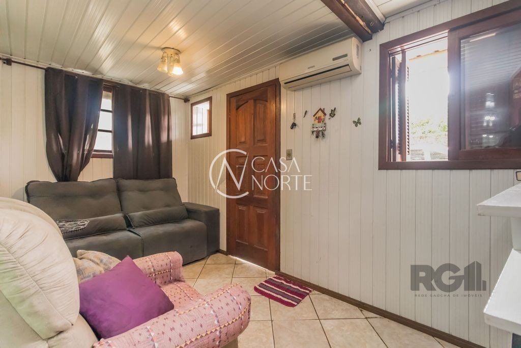 Casa à venda com 4 quartos, 224m², 2 vagas, Avenida Ipê no bairro Vila Jardim em Porto Alegre