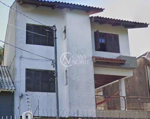 Casa à venda com 3 quartos, 238m², 1 suíte, 2 vagas, Rua General Gomes Carneiro no bairro Medianeira em Porto Alegre