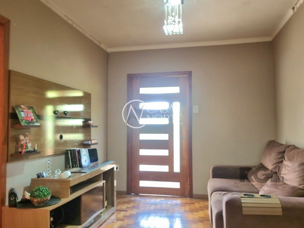 Casa à venda com 3 quartos, 140m², 1 vaga, Rua Dário Totta no bairro Teresópolis em Porto Alegre