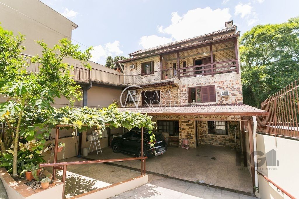 Casa à venda com 5 quartos, 415m², 1 suíte, 4 vagas, Rua Ursa Maior no bairro Cristal em Porto Alegre