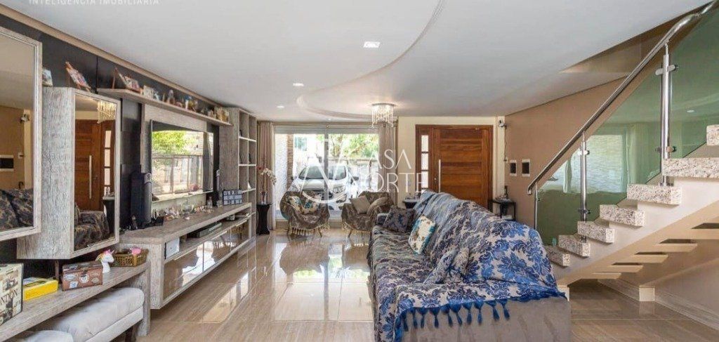 Casa à venda com 3 quartos, 332m², 3 suítes, 2 vagas, Rua Pasteur no bairro Ipanema em Porto Alegre