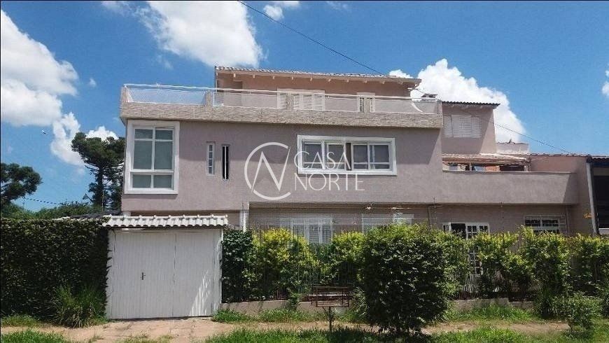Casa à venda com 5 quartos, 188m², 2 suítes, 4 vagas, Rua Waldomiro Schapke no bairro Partenon em Porto Alegre