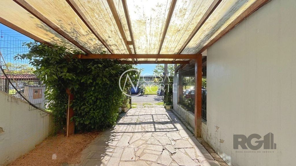 Casa à venda com 2 quartos, 84m², 1 suíte, 2 vagas, Rua Baldoino Bottini no bairro Hípica em Porto Alegre