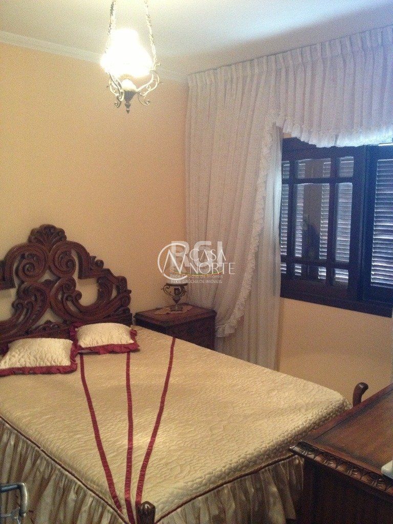 Casa de Condomínio à venda com 4 quartos, 350m², 1 suíte, 2 vagas, Rua Alcebiades Antônio dos Santos no bairro Nonoai em Porto Alegre