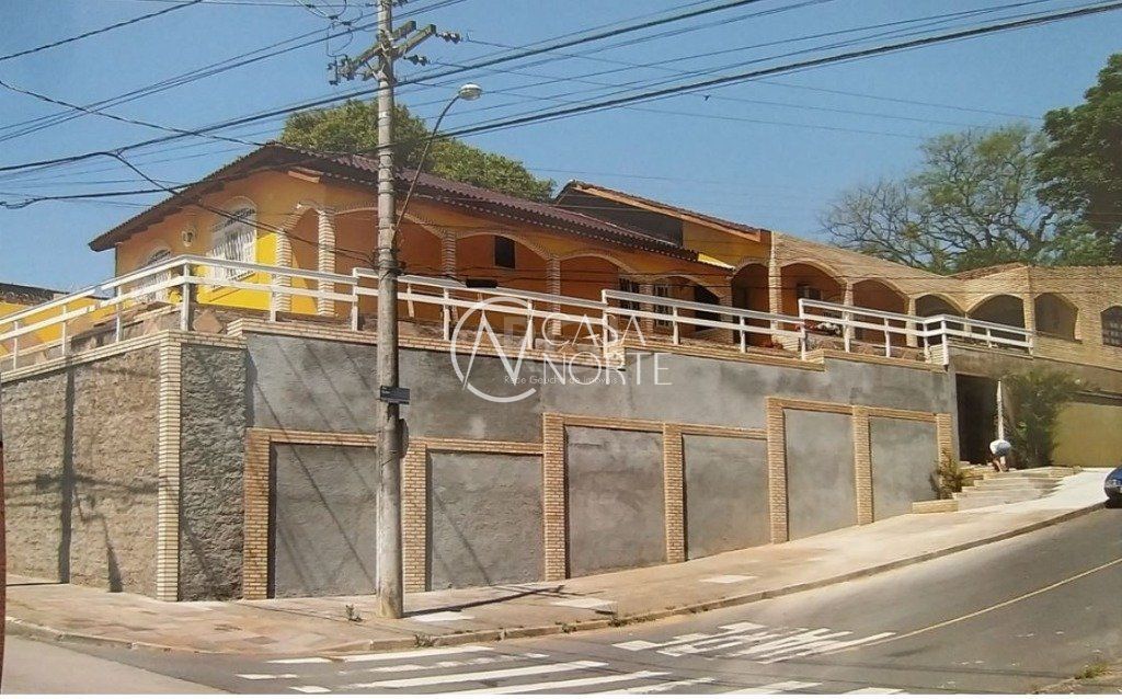 Casa à venda com 7 quartos, 400m², 1 suíte, 2 vagas, Rua Coronel Aparício Borges no bairro Glória em Porto Alegre