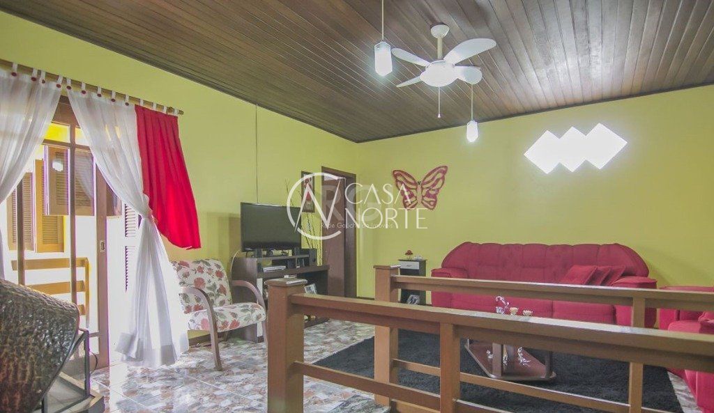 Casa à venda com 3 quartos, 252m², 1 suíte, 3 vagas, Rua Lola de Oliveira no bairro Parque Santa Fé em Porto Alegre