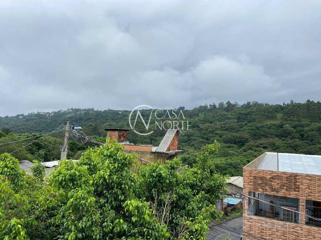 Casa à venda com 2 quartos, 10952m², 2 vagas, Rua Figueira Centenaria no bairro Vila Nova em Porto Alegre