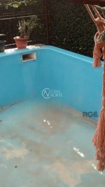 Casa à venda com 3 quartos, 320m², 3 vagas, Rua Doutor Osvaldo Degrazia no bairro Costa e Silva em Porto Alegre