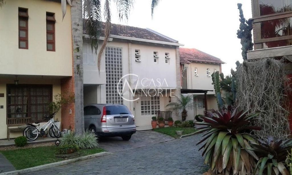 Casa de Condomínio à venda com 3 quartos, 350m², 2 suítes, 2 vagas, Rua Conrado Ferrari no bairro Jardim Isabel em Porto Alegre
