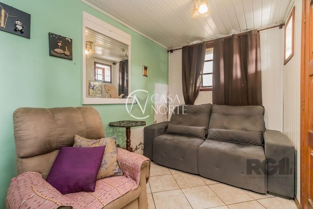 Casa à venda com 4 quartos, 224m², 2 vagas, Avenida Ipê no bairro Vila Jardim em Porto Alegre