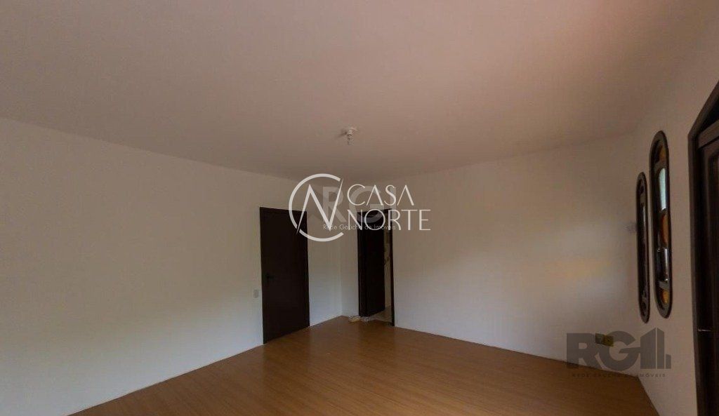 Casa à venda com 4 quartos, 450m², 3 suítes, 5 vagas, Rua Marcio Dias no bairro Nonoai em Porto Alegre