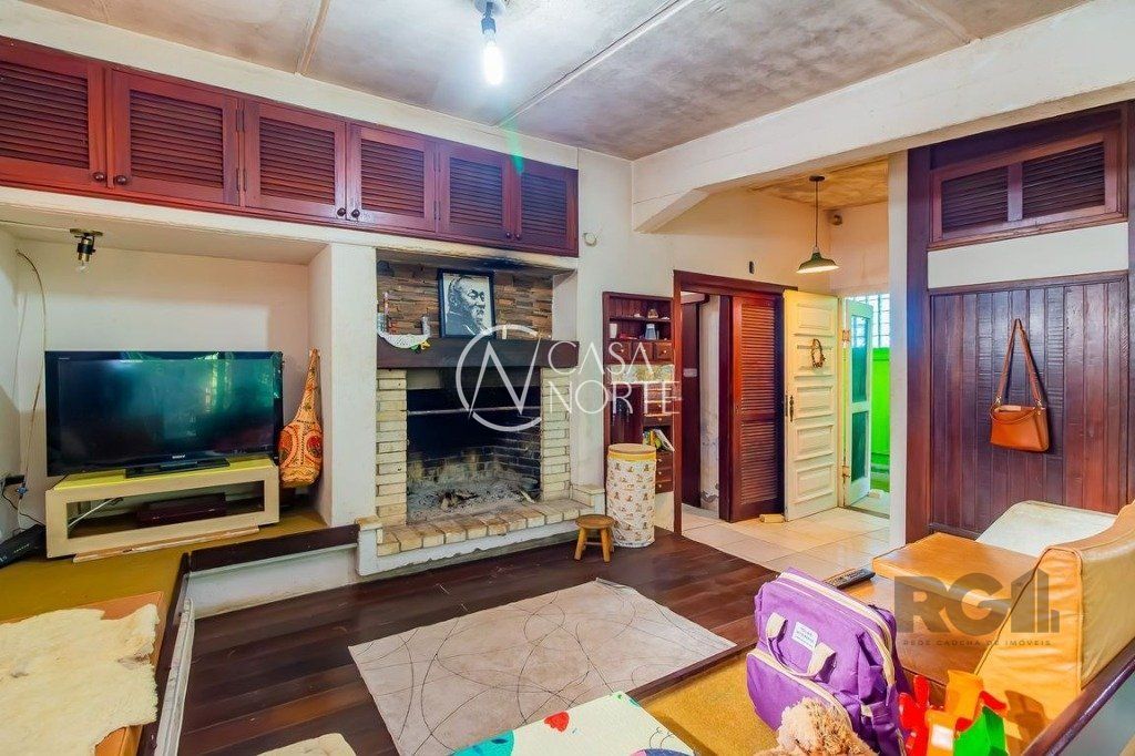 Casa à venda com 4 quartos, 213m², 2 vagas, Rua Jorge Mello Guimarães no bairro Belém Novo em Porto Alegre