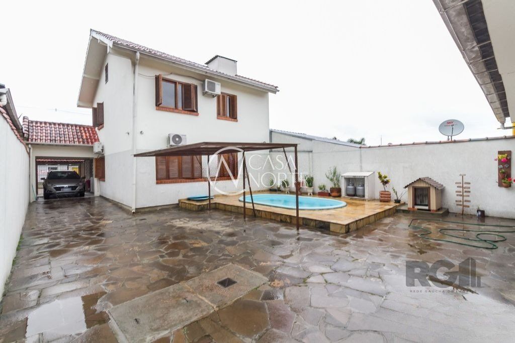 Casa à venda com 4 quartos, 207m², 1 suíte, 6 vagas, Rua Doutor Hermes Pacheco no bairro Aberta dos Morros em Porto Alegre