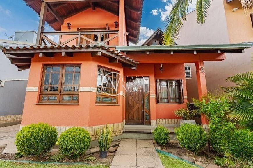 Casa à venda com 3 quartos, 209m², 1 suíte, 3 vagas, Rua Maria Elaine Wotter no bairro Parque Santa Fé em Porto Alegre