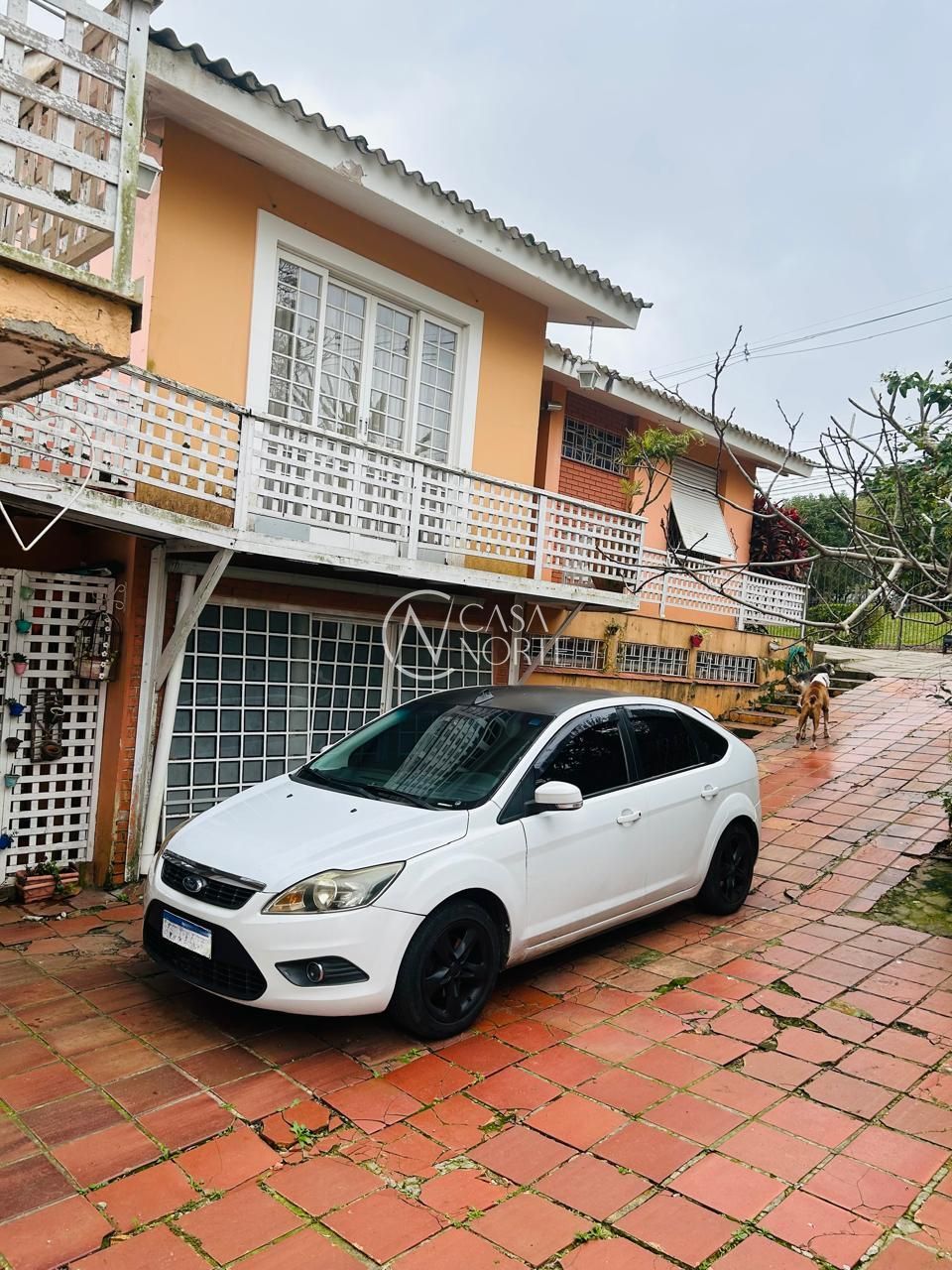 Casa à venda com 3 quartos, 206m², 3 vagas, Rua Antônio Pereira Júnior no bairro Santa Tereza em Porto Alegre