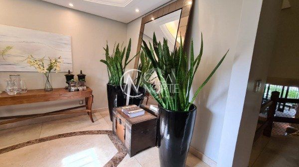 Casa de Condomínio à venda com 4 quartos, 741m², 4 suítes, 2 vagas, Rua Gustavo Schmidt no bairro Três Figueiras em Porto Alegre