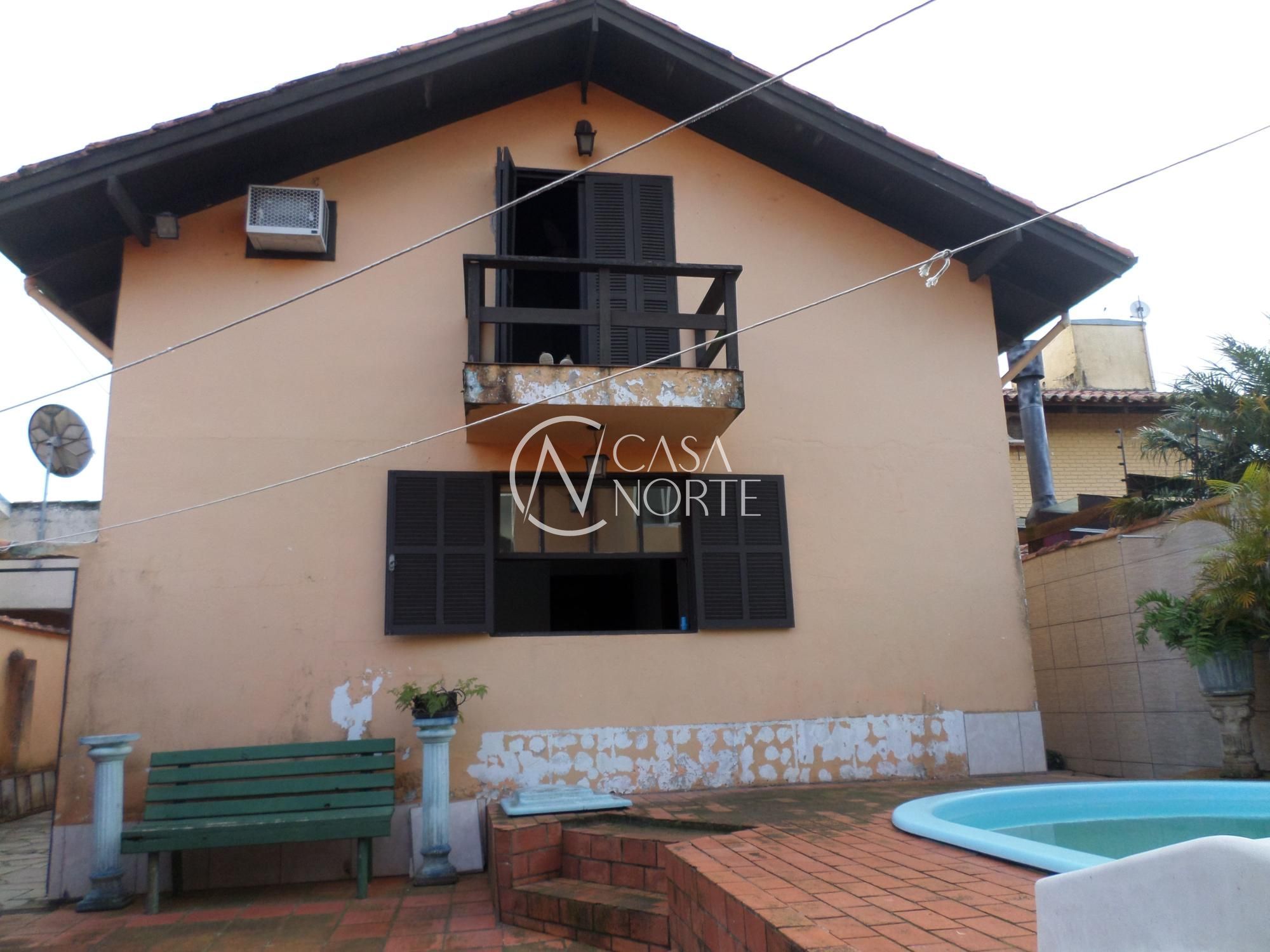 Casa à venda com 7 quartos, 350m², 4 suítes, 8 vagas, Rua Engenheiro Tito Marques Fernandes no bairro Ipanema em Porto Alegre