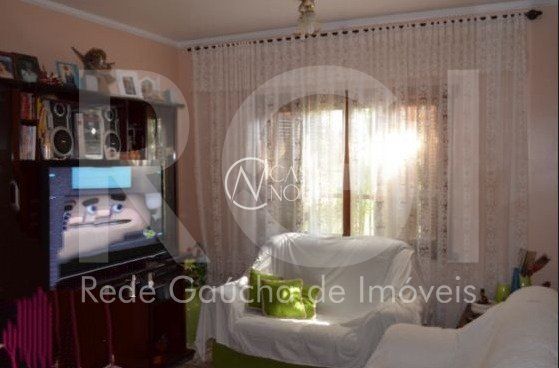 Casa à venda com 3 quartos, 149m², 1 suíte, 1 vaga, Rua Panambi no bairro Cavalhada em Porto Alegre