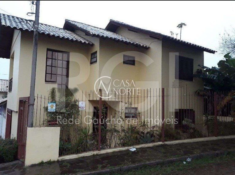 Casa à venda com 3 quartos, 149m², 1 suíte, 1 vaga, Rua Panambi no bairro Cavalhada em Porto Alegre