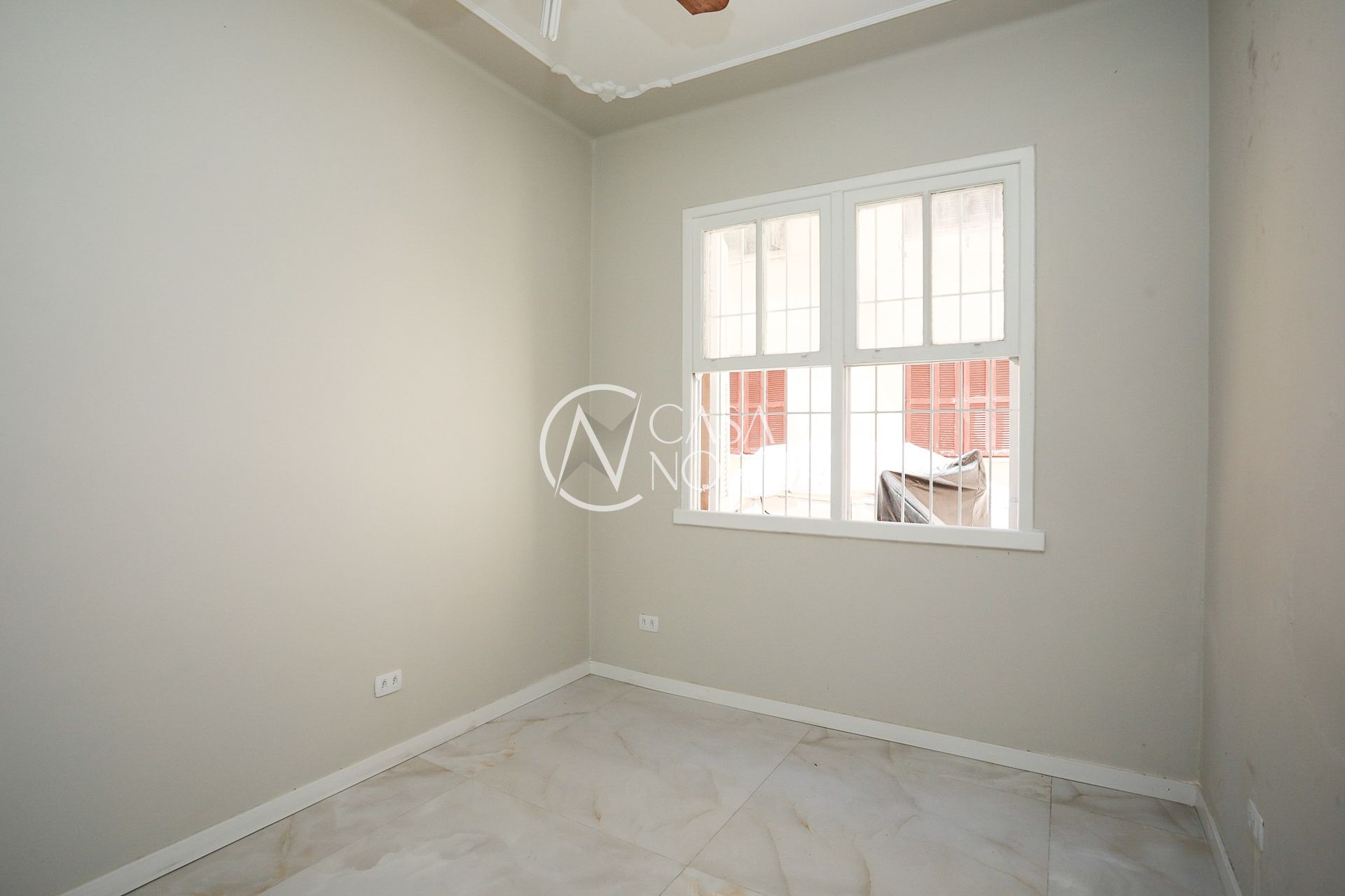 Apartamento à venda com 2 quartos, 63m², 1 vaga, Rua Dezessete de Junho no bairro Menino Deus em Porto Alegre