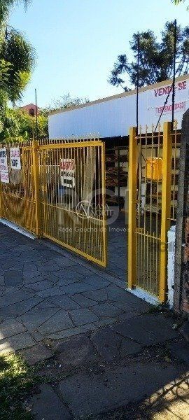 Terreno à venda  com 326m², Rua Florinha no bairro Cavalhada em Porto Alegre