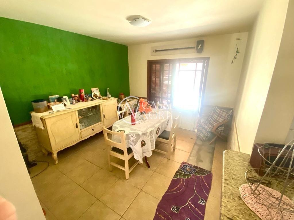 Casa de Condomínio à venda com 3 quartos, 139m², 1 suíte, 2 vagas, Rua Ponciano Pacheco da Silveira no bairro Guarujá em Porto Alegre