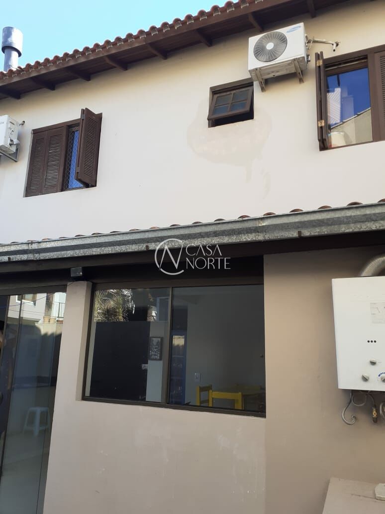 Casa de Condomínio à venda com 4 quartos, 192m², 1 suíte, 2 vagas, Rua Ponciano Pacheco da Silveira no bairro Guarujá em Porto Alegre