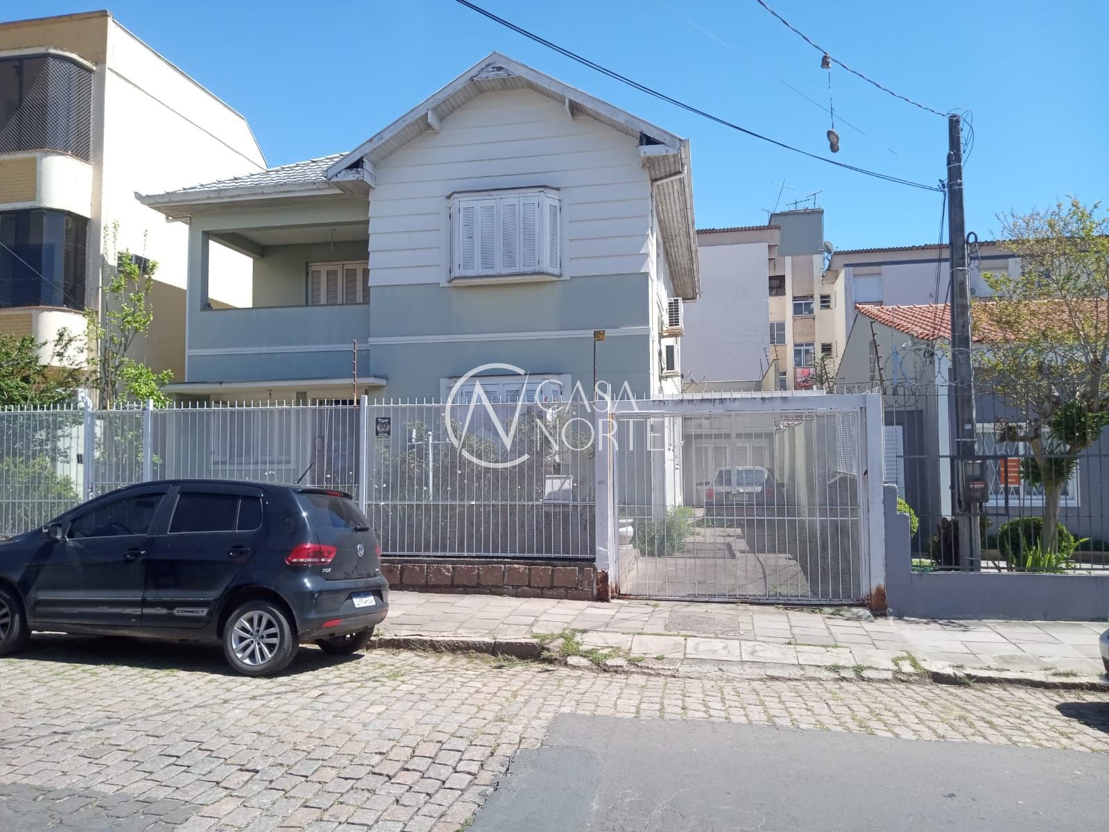 Casa à venda com 5 quartos, 302m², 4 suítes, 4 vagas, Rua Doutor Voltaire Pires no bairro Santo Antônio em Porto Alegre