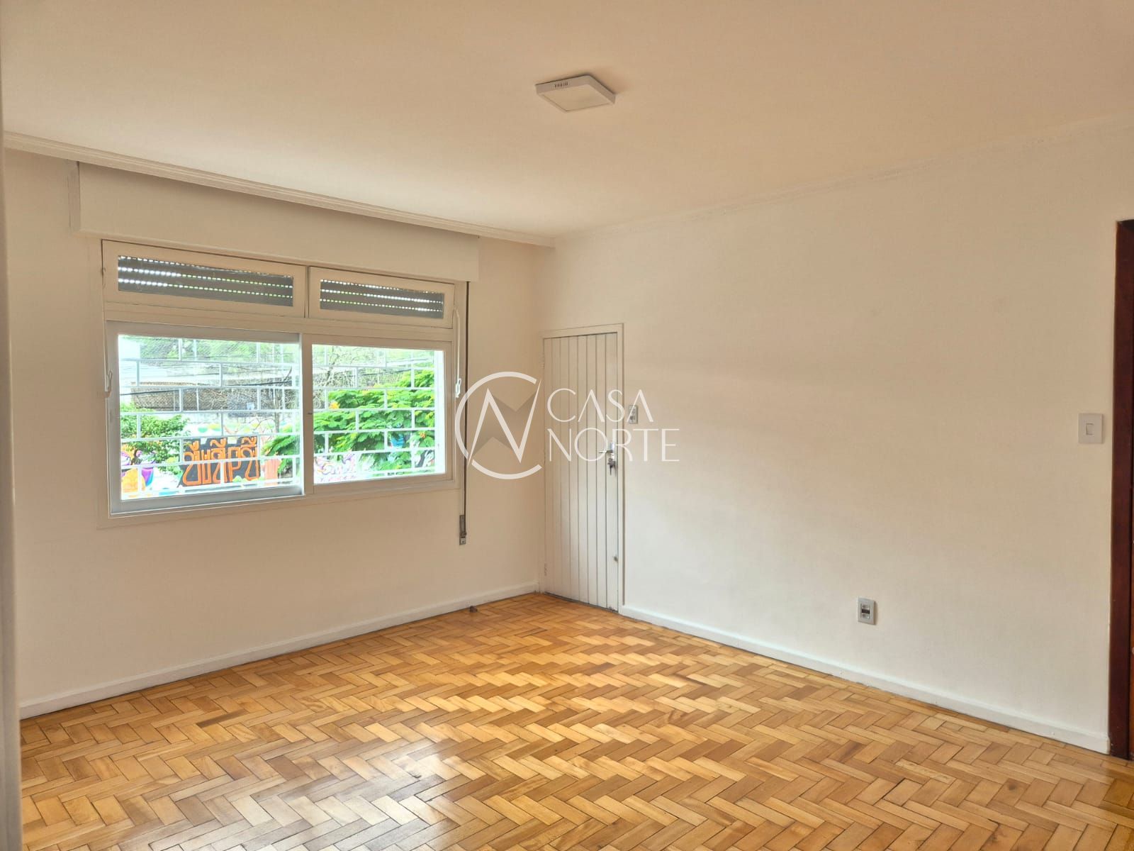 Apartamento à venda com 2 quartos, 72m², 1 vaga, Rua Mucio Teixeira no bairro Menino Deus em Porto Alegre