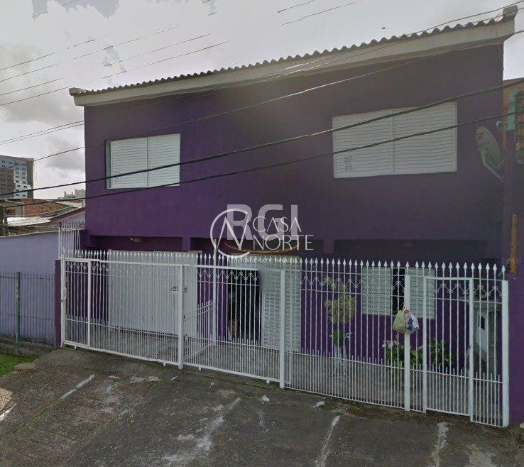 Casa à venda com 2 quartos, 165m², 2 vagas, Rua Doutor Alberto Barbosa no bairro Vila Ipiranga em Porto Alegre