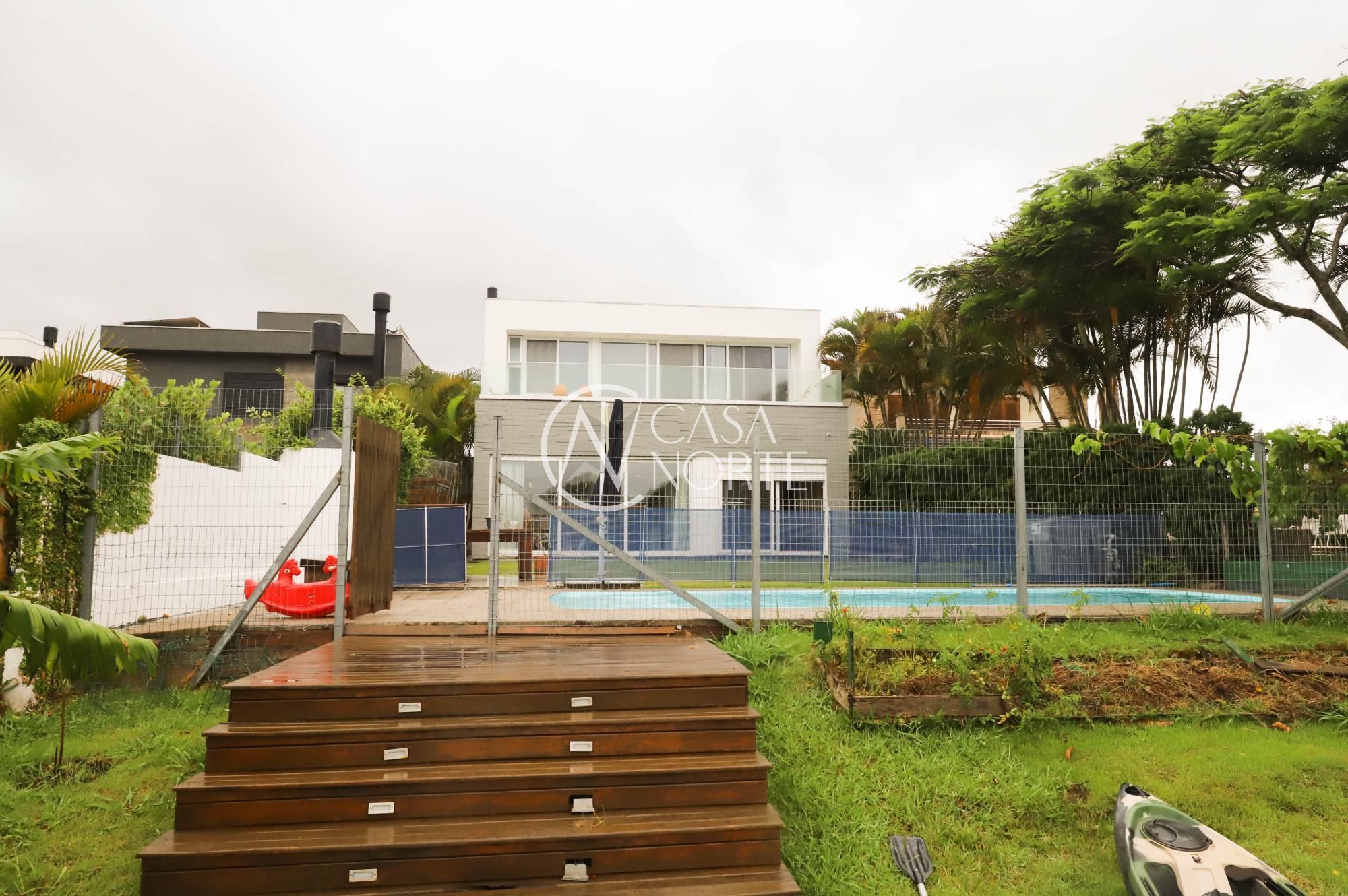 Casa de Condomínio à venda com 5 quartos, 253m², 5 suítes, 4 vagas, Avenida Juca Batista no bairro Belém Novo em Porto Alegre