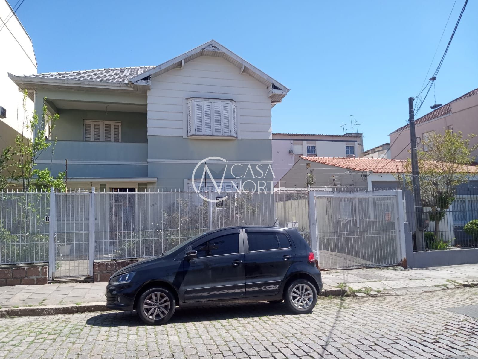 Casa à venda com 5 quartos, 302m², 4 suítes, 4 vagas, Rua Doutor Voltaire Pires no bairro Santo Antônio em Porto Alegre