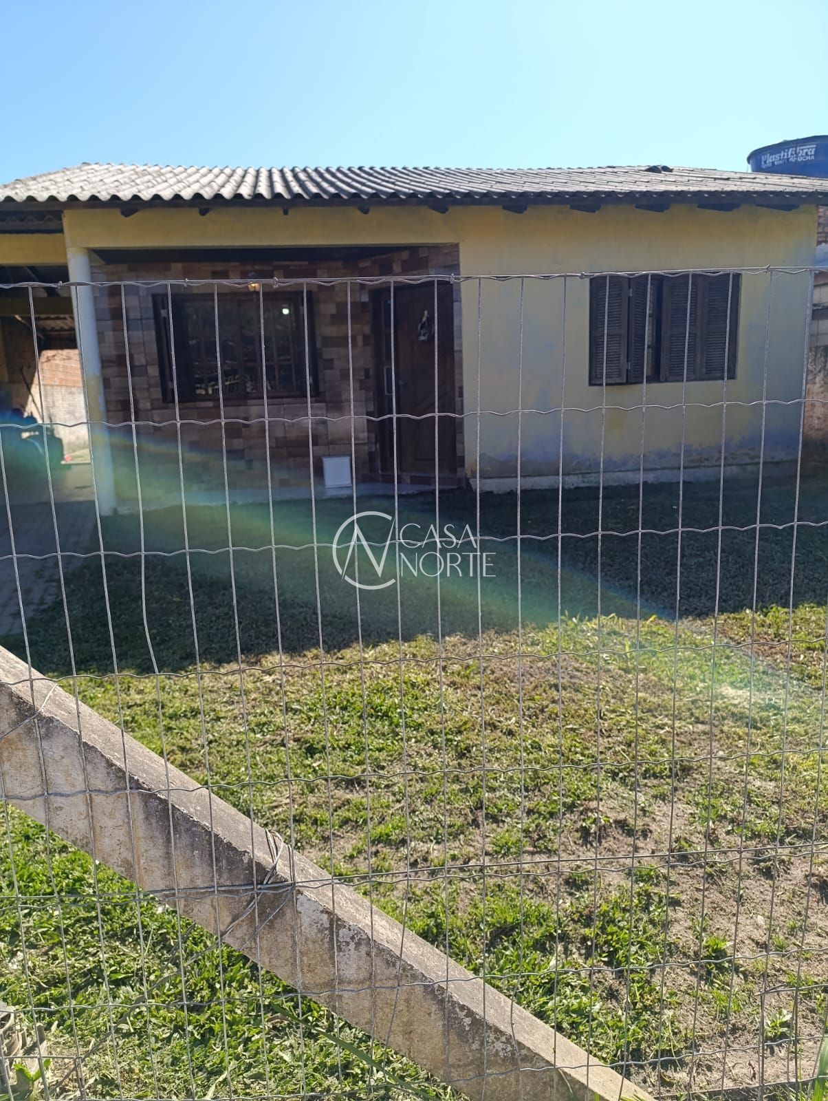 Casa à venda com 2 quartos com 360m², 2 vagas, Rua Gedi dos Santos Silva (Primavera) no bairro Lami em Porto Alegre