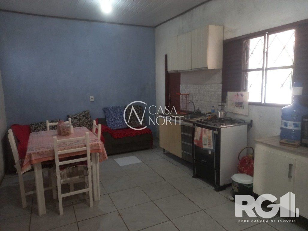 Casa à venda com 3 quartos, 108m², 2 vagas, Rua Primavera do Varejão no bairro Lami em Porto Alegre