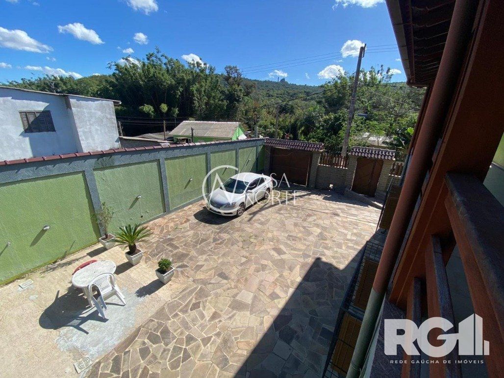 Casa à venda com 4 quartos, 269m², 1 suíte, 3 vagas, Rua Ventura Pinto no bairro Belém Velho em Porto Alegre