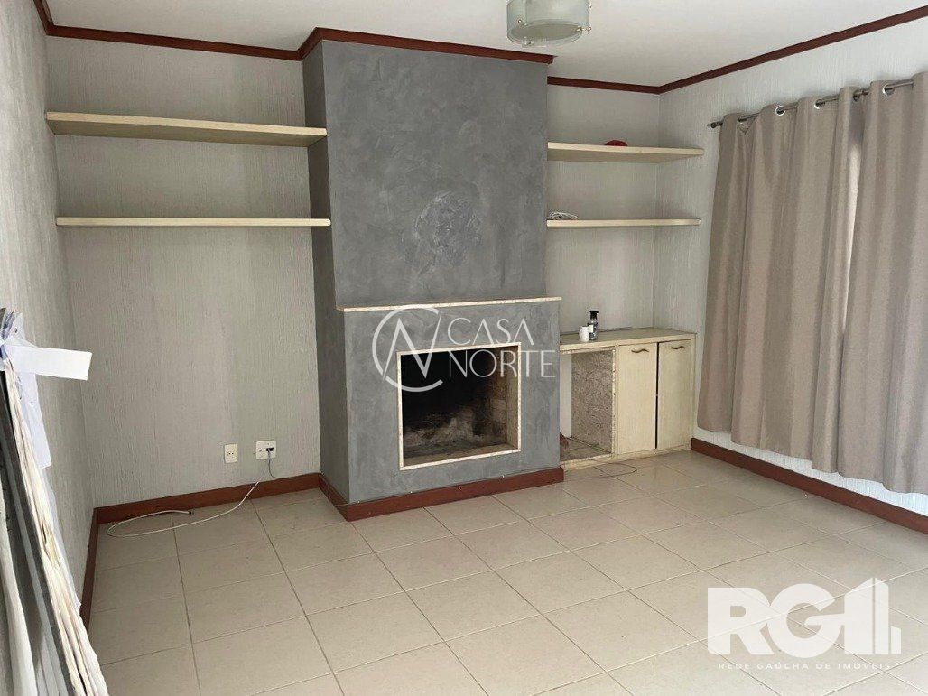 Casa de Condomínio à venda com 3 quartos, 239m², 1 suíte, 2 vagas, Rua Gilberto Laste no bairro Santa Tereza em Porto Alegre