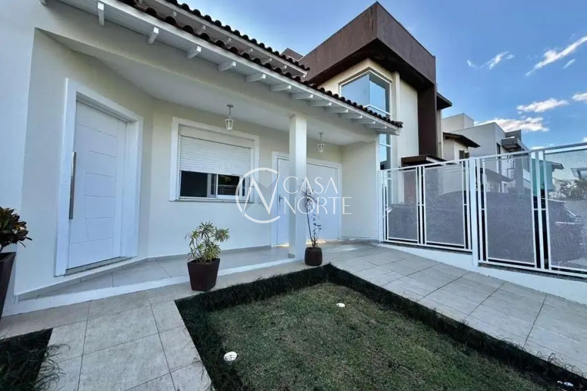 Casa de Condomínio à venda com 3 quartos, 112m², 1 suíte, 2 vagas, Rua Arahy Borges Ortiz no bairro Mário Quintana em Porto Alegre