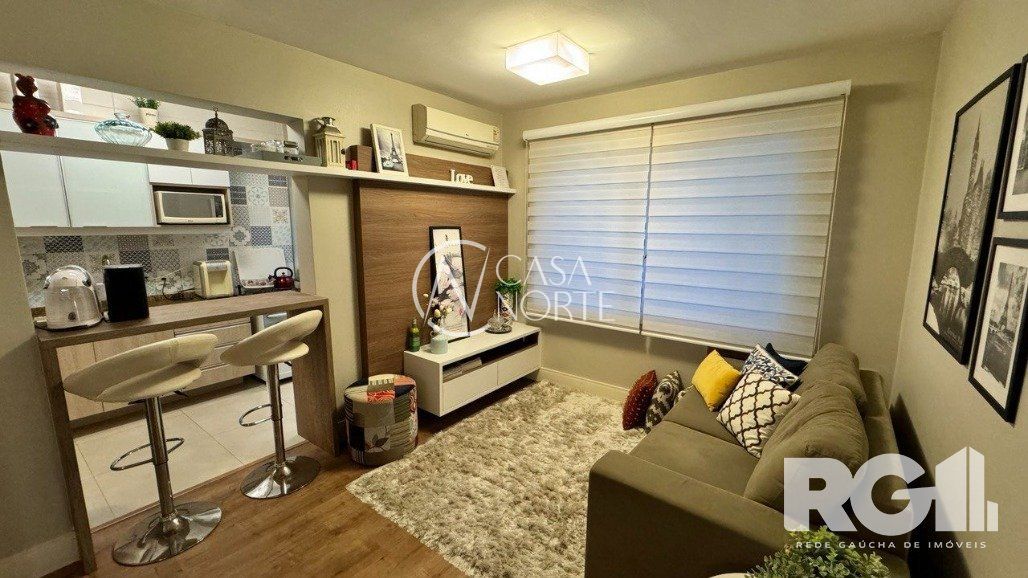 Apartamento à venda com 1 quarto, 52m², 1 suíte, 1 vaga, Avenida Mariland no bairro Auxiliadora em Porto Alegre