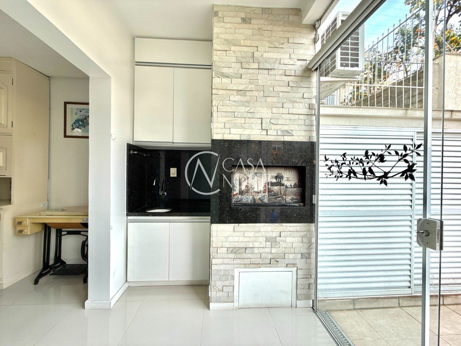 Casa à venda com 3 quartos, 247m², 3 suítes, 4 vagas, Rua Tunísia no bairro Cristo Redentor em Porto Alegre