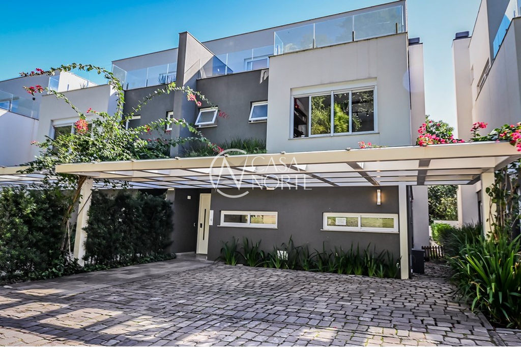 Casa de Condomínio à venda com 3 quartos, 438m², 3 suítes, Doutor Ney de Castilhos Ferreira no bairro Pedra Redonda em Porto Alegre