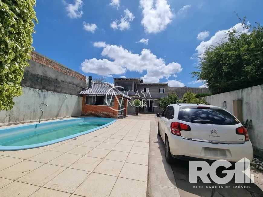 Casa à venda com 3 quartos, 150m², 1 suíte, 4 vagas, Rua Coronel João Pacheco de Freitas no bairro Jardim Itu em Porto Alegre