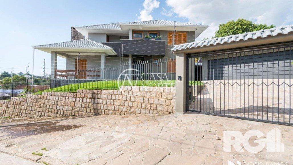 Casa à venda com 3 quartos, 258m², 1 suíte, 4 vagas, Rua Doutor Paulino Guerra no bairro Jardim Itu em Porto Alegre