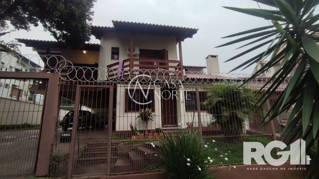 Casa à venda com 4 quartos, 396m², 1 suíte, 5 vagas, Rua Ludwig Jacob Hubler no bairro Jardim Itu em Porto Alegre