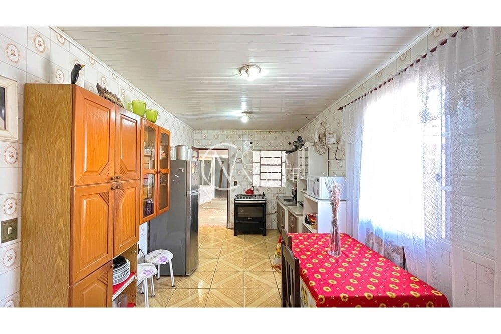 Casa à venda com 3 quartos, 104m², 1 suíte, 3 vagas, Coronel Tisiano F. de Leoni no bairro Partenon em Porto Alegre